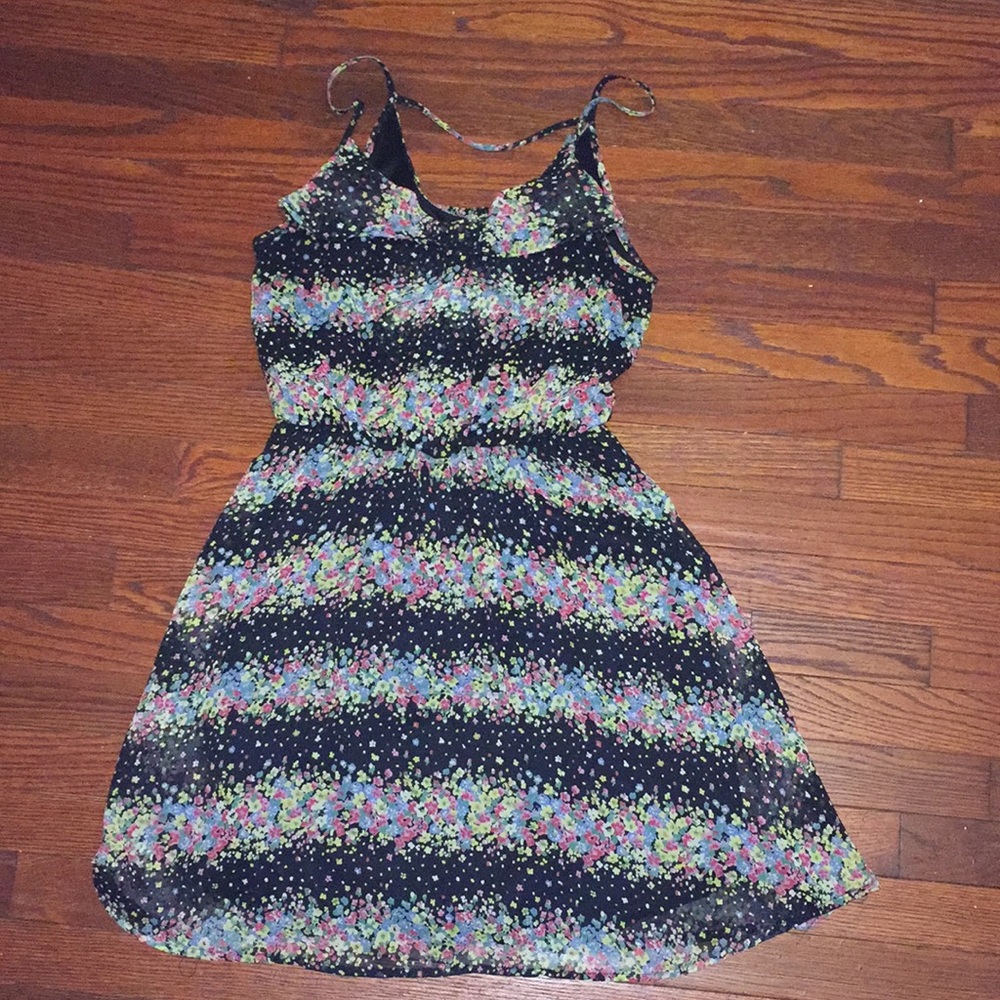 Flowy black dress with floral pattern